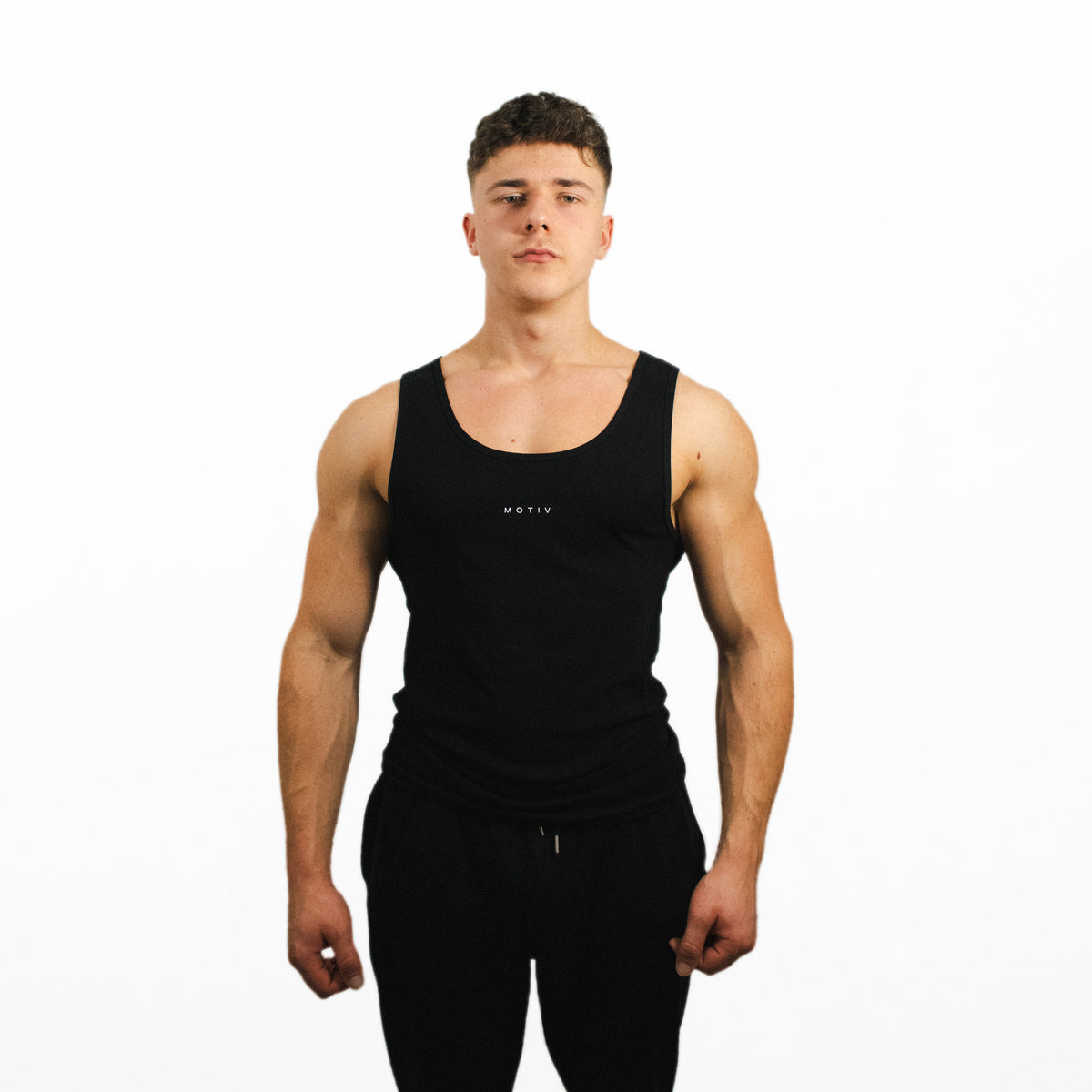 ESSENTIALS FITTED VEST - BLACK